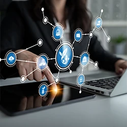 A businesswoman interacting with a glowing digital interface of interconnected icons, showcasing the reach of Technology & Digital Services.