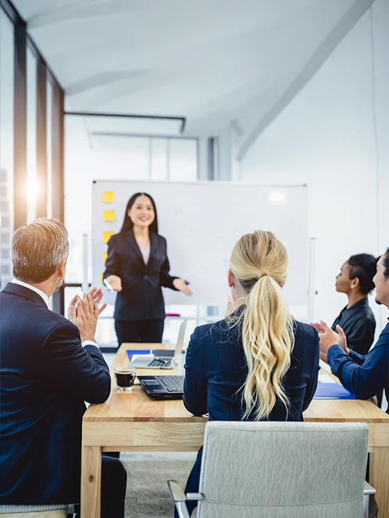 Online Focus Group Interviews with business professionals participating in a collaborative discussion and presentation in a modern office setting.